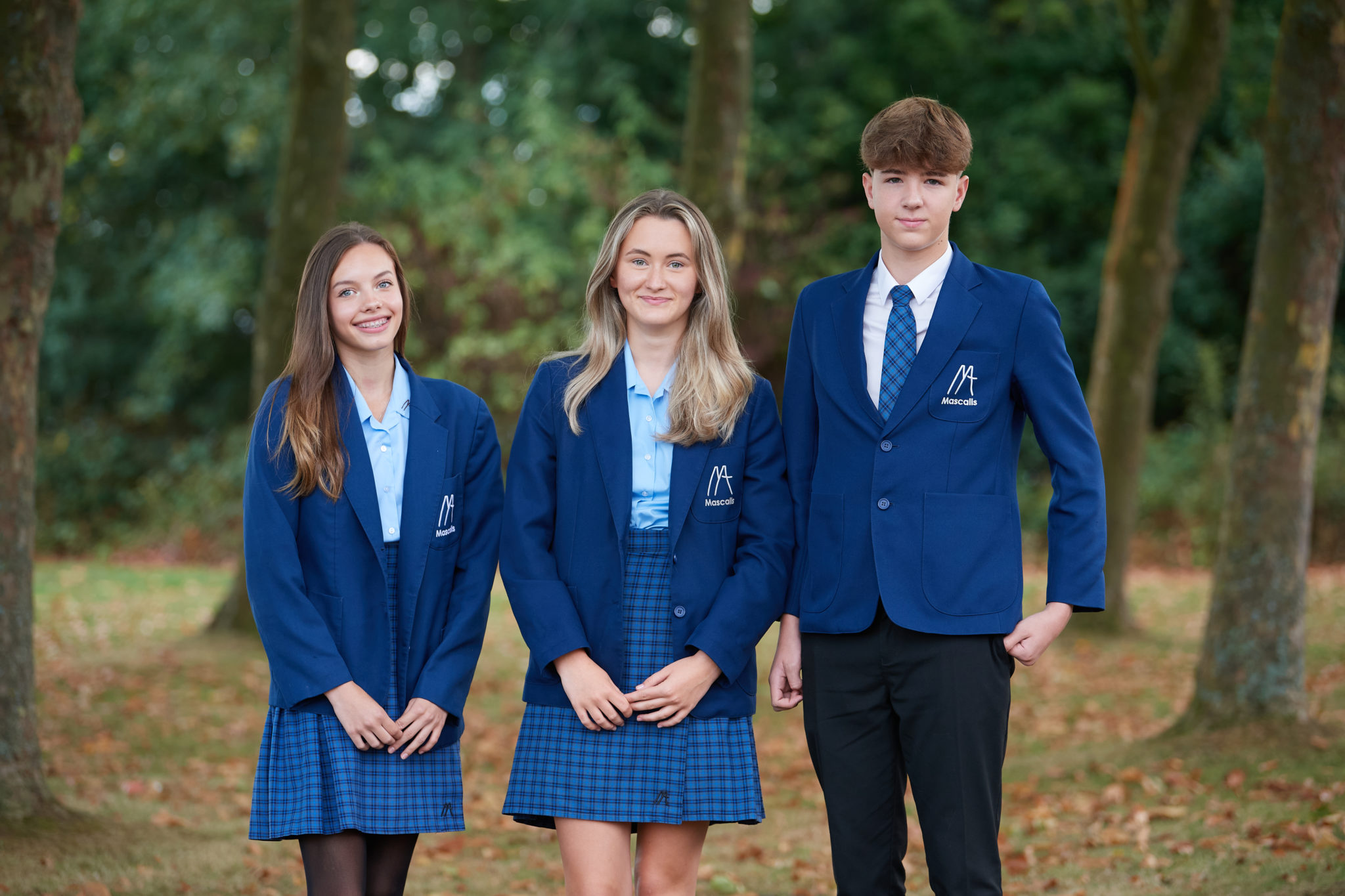 Students smiling at the camera