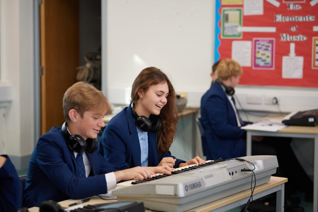 Students playing instrument