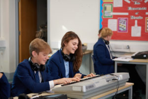 Students playing instrument