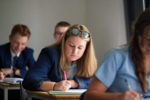 Students focussing in class