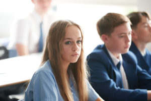 Students focussing in class