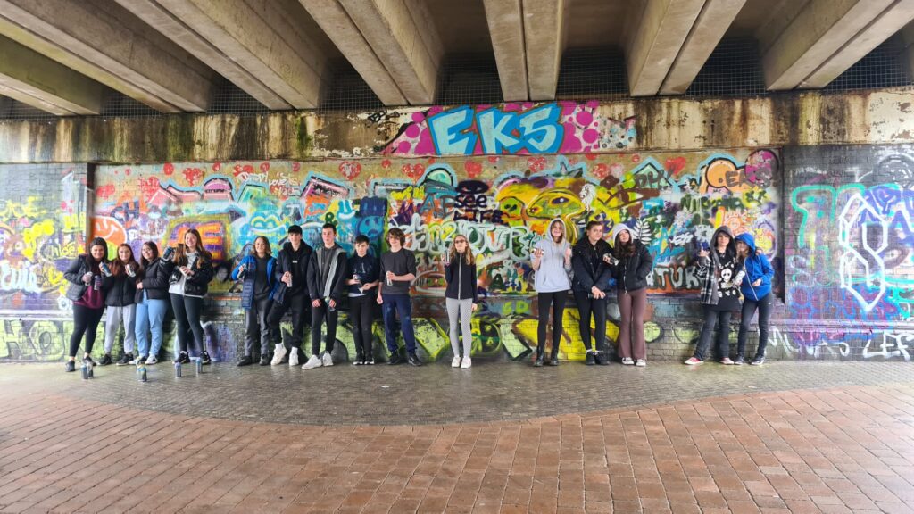 Students partaking in street art