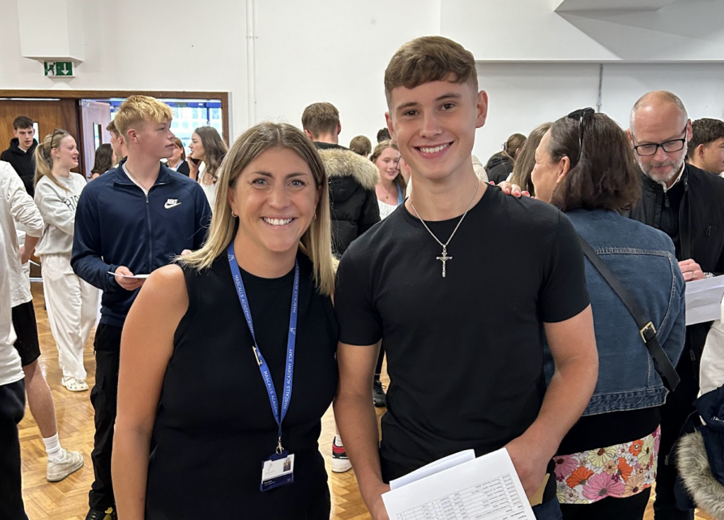 Students holding their results