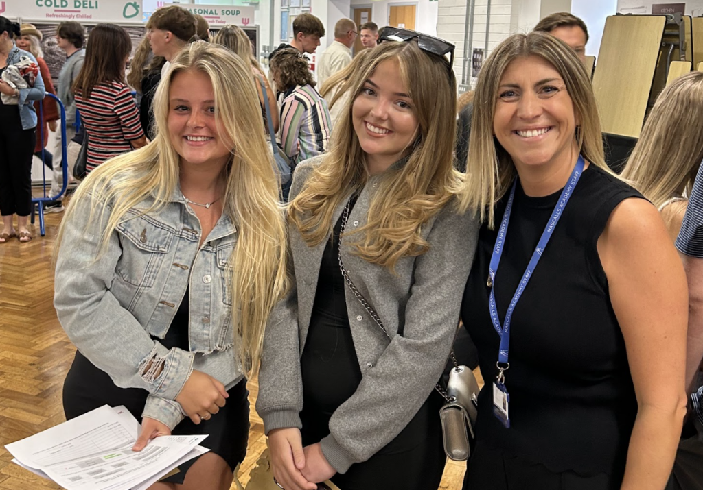 Students holding their results