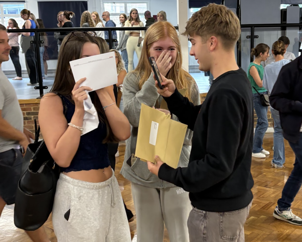 Students holding their results