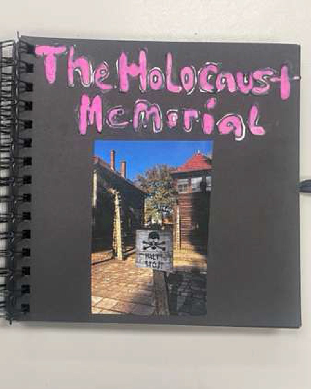 A scrapbook with the title 'The Holocaust Memorial'